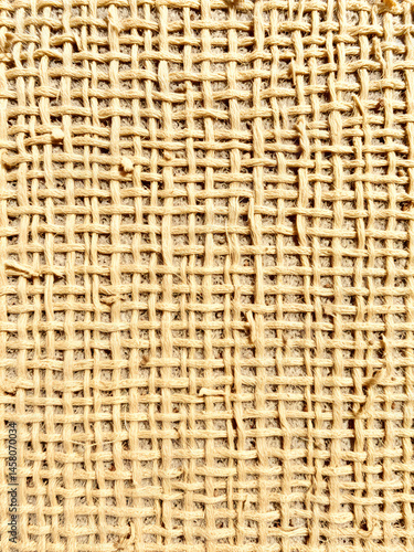 A coarse, rough background of a sisal material