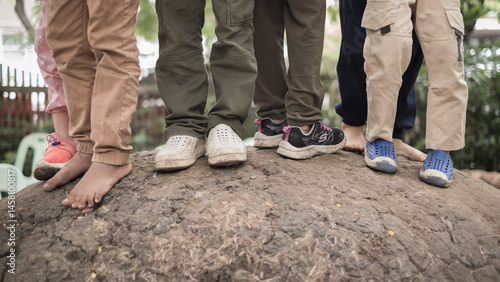 Feet of children in the park
