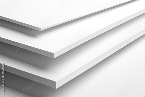 Stacked white sheets of rigid material