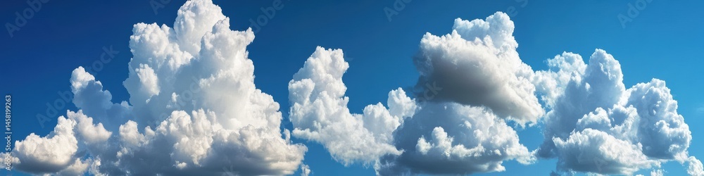Obraz premium Dramatic panorama of blue sky with fluffy clouds nature landscape high contrast shadows