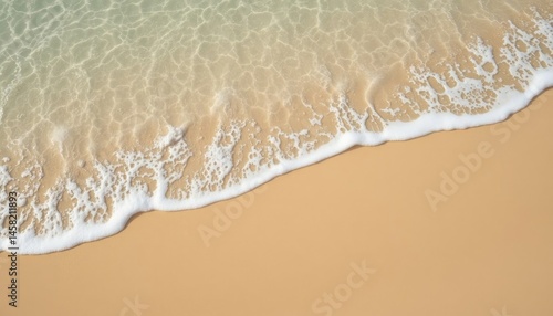 Soft calm waves on the sea sand Clear clean water washes fine golden sand