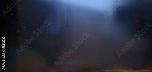 Film light leak effect, photographic overlay with glow. Grungy dusty texture with random scattered particles. Vintage analog retro vibe for cinematic video transitions, stylized photography edits.