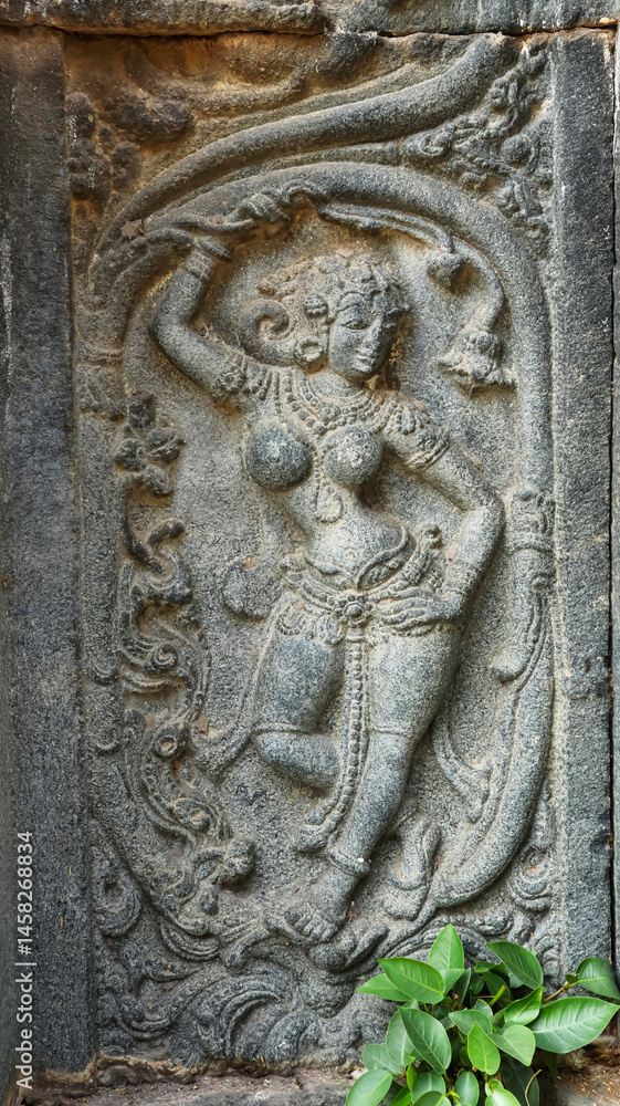 Naklejka premium Carved sculpture of a Salabhanjika on Shri Pachchala Someshwara Temple, Panagallu, Nalgonda, Telangana, India.