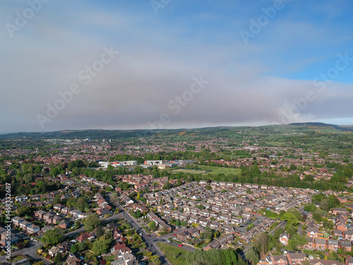 Canvas-taulu A plume of smoke over Macclesfield from a moorland wild fire on the moors of the