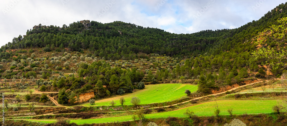 Landscape between mountains around the medieval village of Rafales, Teruel, Spain.