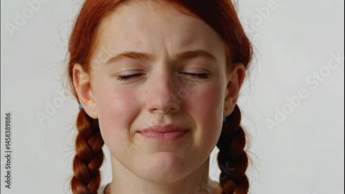 Portrait of a Girl with Braided Red Hair