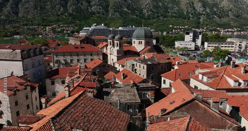 Cruise Ship At The Terminal With Saint Nicholas Church In Kotor, Montenegro. - aerial shot Cruise Ship At The Terminal With Saint Nicholas Church In Kotor, Montenegro. - aerial shot