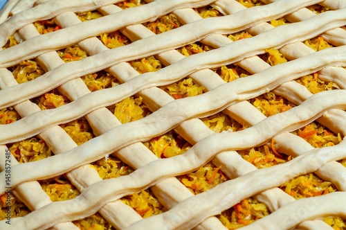 Obraz na płótnie Delicious homemade vegetable pie with a beautiful golden lattice crust and fresh filling. w salonie