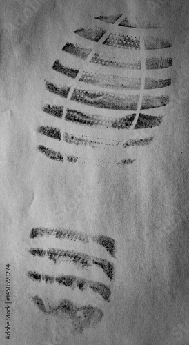 Shoe print on white surface