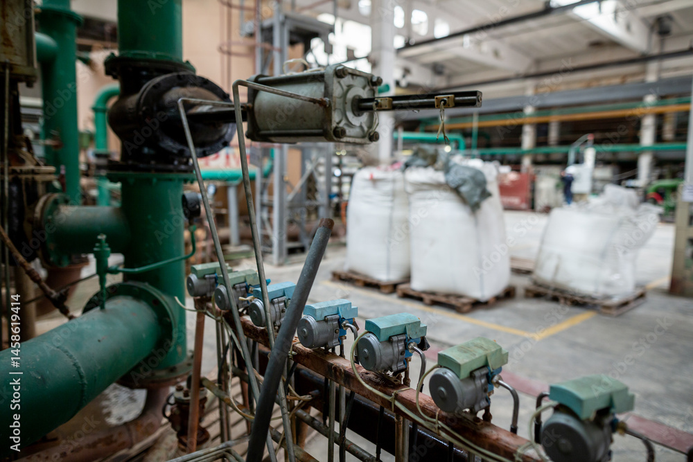 Archaic outdated system of water treatment area for a heat exchanger circuit, including purification units and bags of filtration materials such as sulfocarbon, cationite, ionite, and anionite.