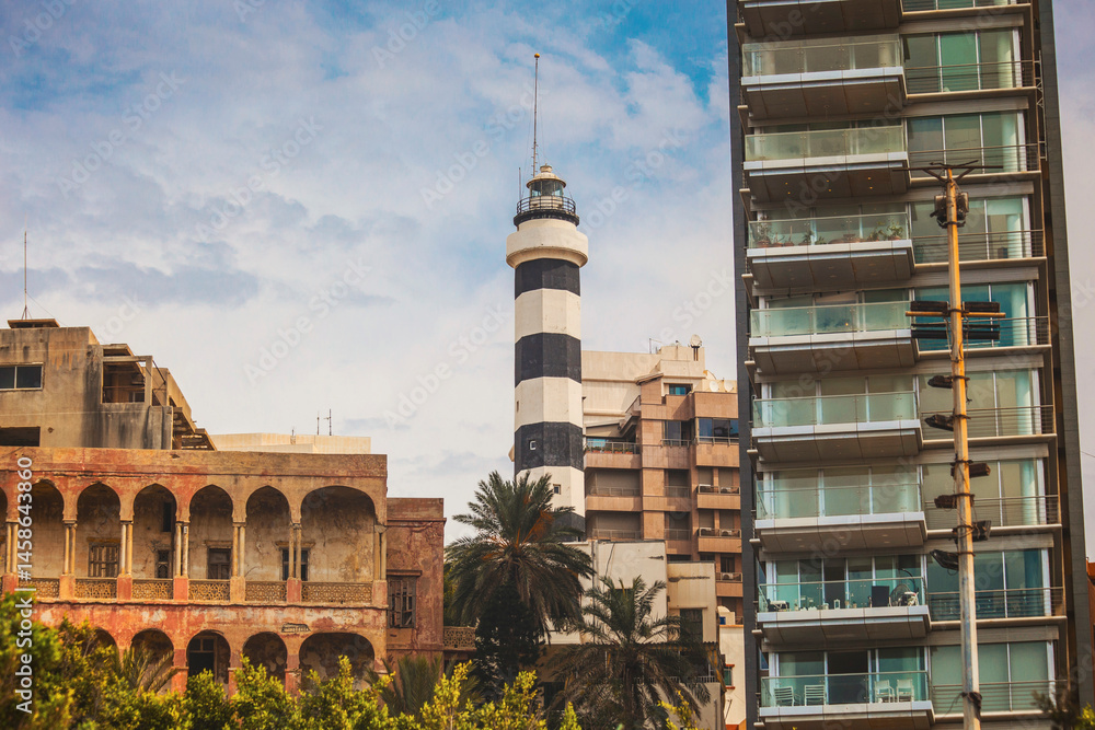 Obraz premium Old Beirut lighthouse surrounded with houses in Beirut downtown, Lebanon