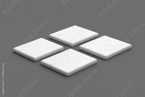 Four square, off-white stone coasters arranged diagonally