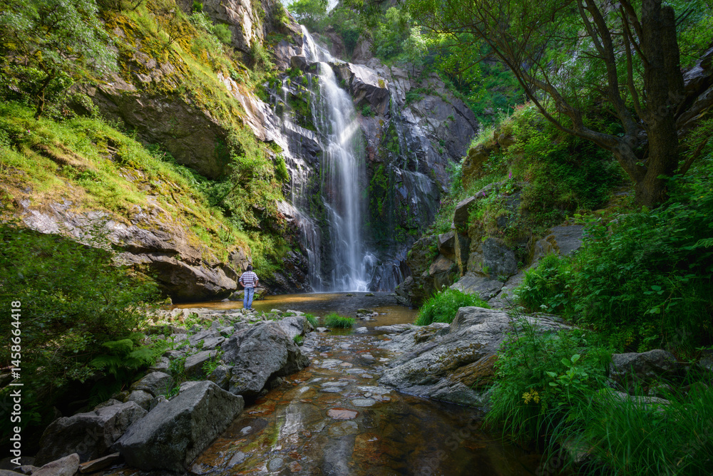 Contemplating the light playing with the water and the majesty of the Toxa waterfall Contemplating the light playing with the water and the majesty of the Toxa waterfall