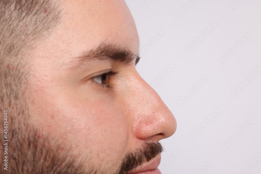 Man on light background, closeup. Space for text Man on light background, closeup. Space for text