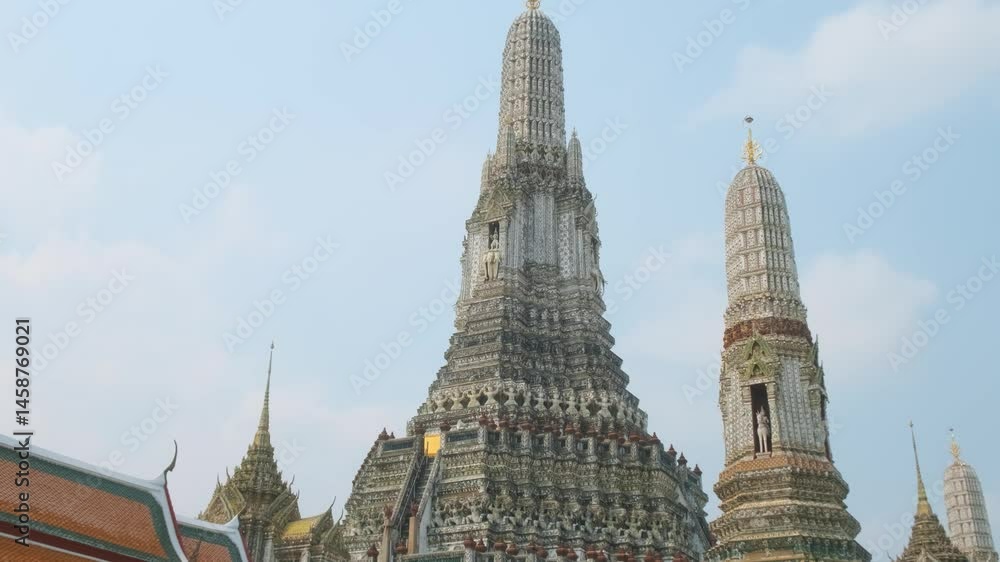 Wat Arun Temple of Dawn in Bangkok city with traditional Thai Buddhist architecture on the bank of Chao Phraya river, Thailand, Asia. Popular travel and tourism landmark