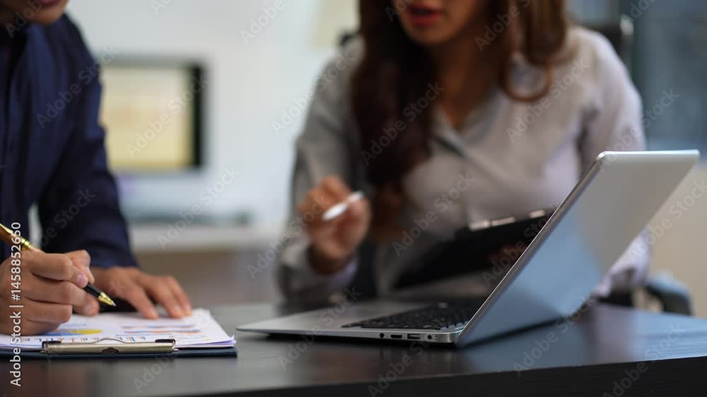 Professionals met in conference room engaged in business-related discussion, Strategizing, problem solutions search. Professionals met in conference room engaged in business-related discussion, Strategizing, problem solutions search.