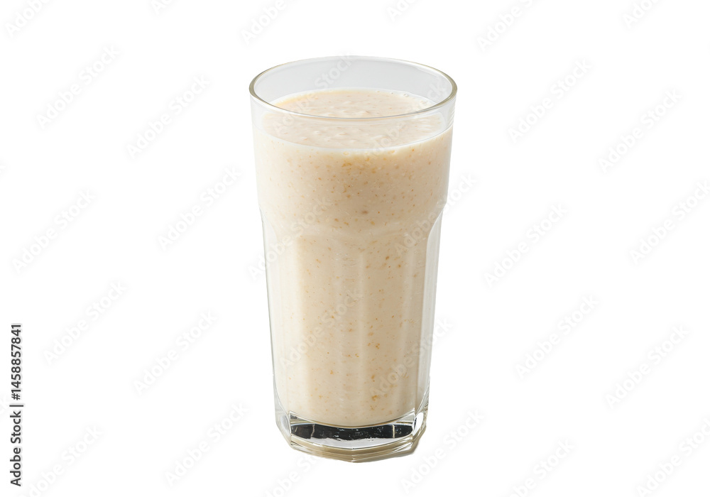 Creamy beige smoothie in a tall clear glass isolated on black Creamy beige smoothie in a tall clear glass isolated on black