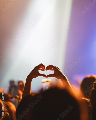Silhouette of Hands Forming a Heart Shape at a Concert