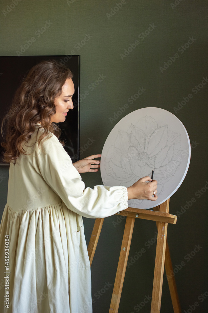 Artist Sketching a Floral Composition on Canvas