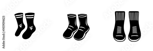 Black icon set featuring various styles of socks for textile and fashion design use