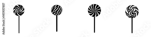 Different designs of flat black lollipop icons with spiral patterns on a white background
