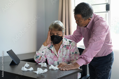An asian senior couple, holding hands, old married man supports his sick and unwell wife with mutual understanding, psychological help, comforting, taking care of each other, spreading loves forever.