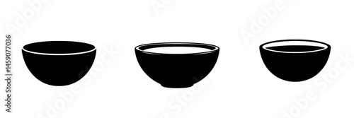 Three flat black bowls with varying shapes and designs showcased against a simple background for culinary representation
