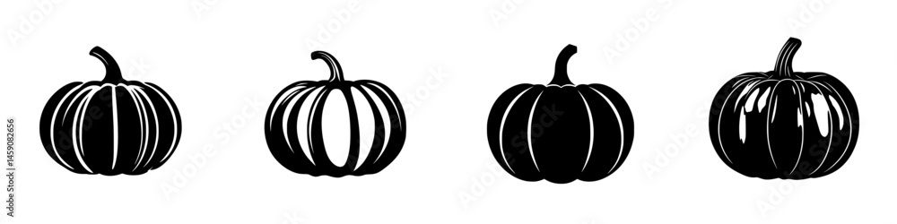 Decorative black pumpkins in various shapes arranged for autumn celebration Decorative black pumpkins in various shapes arranged for autumn celebration