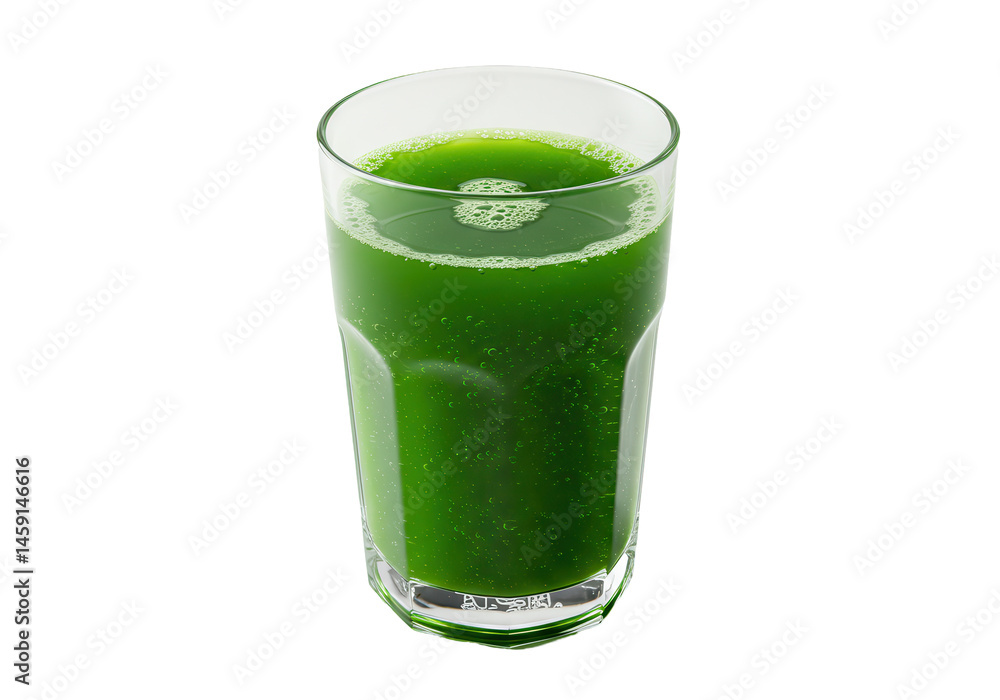 Refreshing green juice in a faceted glass bubbles rising on black Refreshing green juice in a faceted glass bubbles rising on black