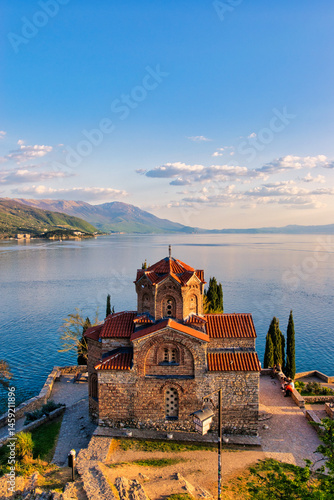 Lake Ohrid, North Macedonia, April 13 2024. Mountain range and peninsula in distance. Ohrid Lake, Macedonia, Europe. The clear mesmerizing waters of lake Ohrid with a beautiful view. 