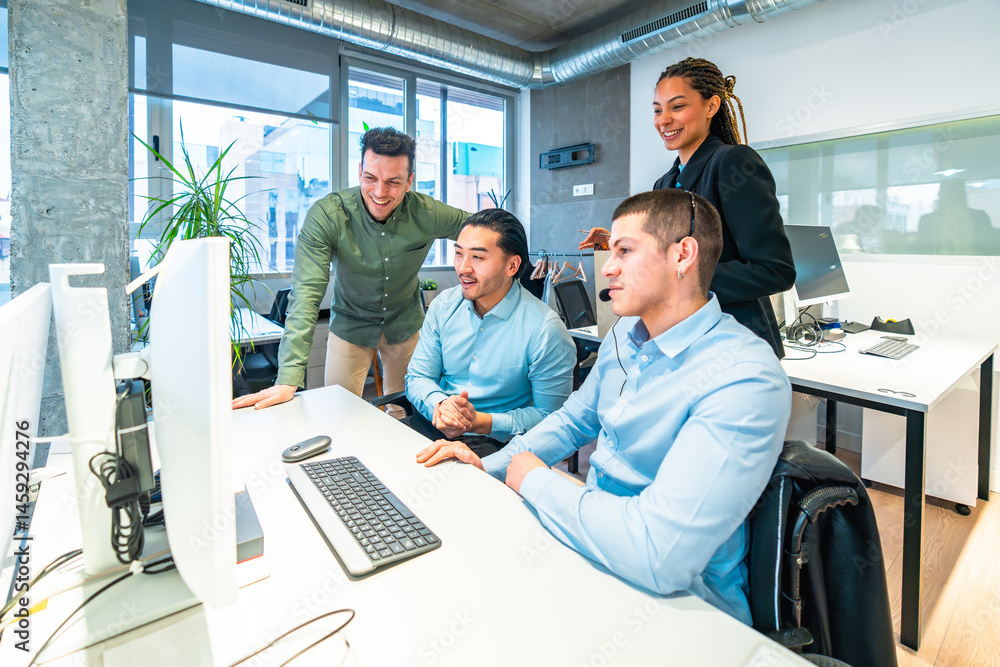 Customer service representatives working together in modern office