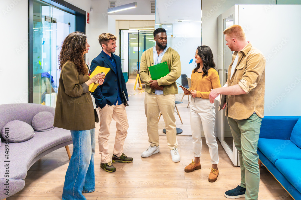 Diverse business team discussing strategy in modern office