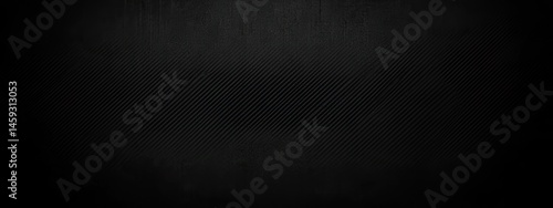 Dark, textured surface with subtle lines