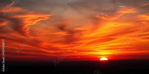 Fototapeta Naklejka Na Ścianę i Meble -  Fiery sunset hues paint a vast, breathtaking twilight sky, orange, dramatic