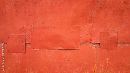 Obraz na płótnie Rusty metal wall with red peeling paint and patch panels w salonie
