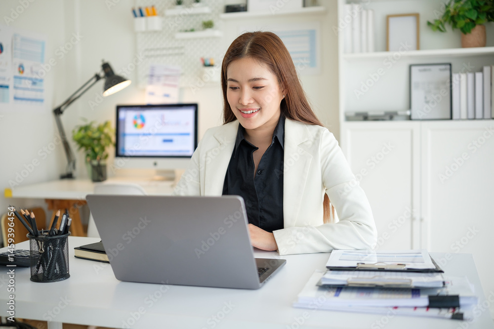 © wattana - Young entrepreneur focusing on digital business operations, demonstrating success and modern work-from-home efficiency. © wattana - Young entrepreneur focusing on digital business operations, demonstrating success and modern work-from-home efficiency.