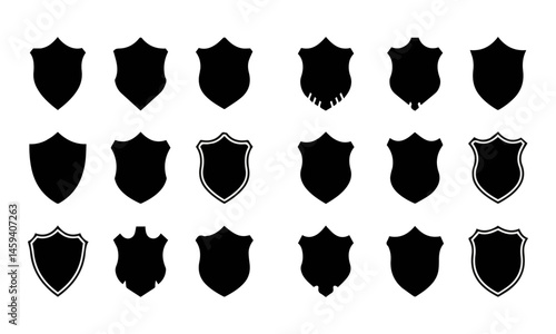 A collection of black shield icons in various shapes and designs against a white background.