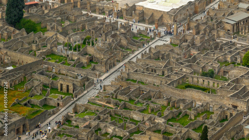Aerial view of the archaeological park of Pompeii, located in the province of Naples, Campania, Italy. It is famous for the remains and ruins of the palaces and houses of an ancient Roman city.