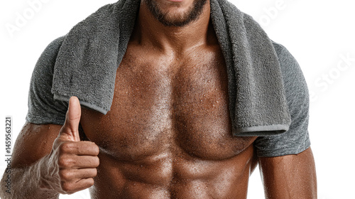 The Symbol of Strength: Close-up of a muscular man, his physique a testament to dedication and fitness, radiates confidence with a thumbs-up gesture. This image encapsulates achievement