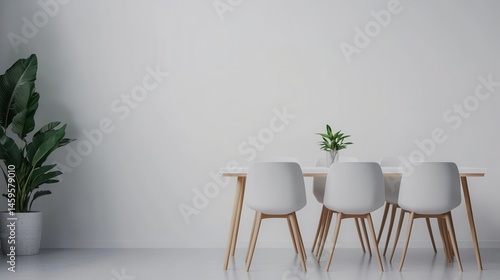 Modern Minimalist Dining Room with White Chairs and Green Plant on Table Against Neutral Wall