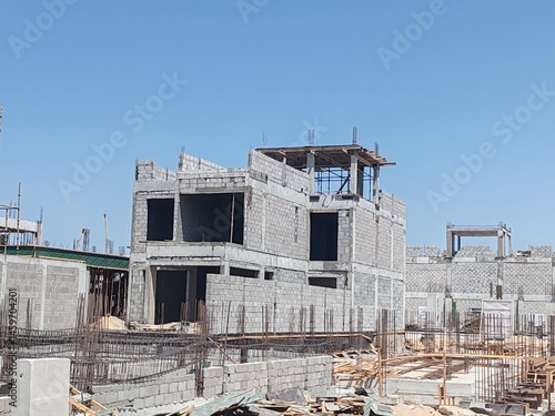 Obraz w ramie Under Construction House Or Villa's,villa's With Concreate Block Or Bricks. Exterior View Of 02 Story Under Construction House With Modern Design. In Complete Villa's, Home Or House full Structure