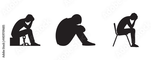 Silhouettes of people sitting in distressed postures, symbolizing emotional struggle, depression, or anxiety