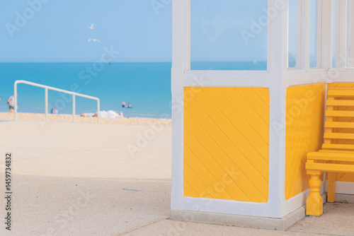 A bright yellow seaside shelter at Southsea in Hampshire