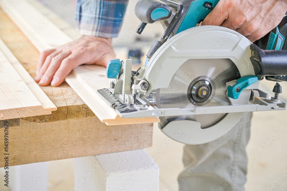 A skilled craftsman operates a circular saw on a wooden plank, showcasing precision and craftsmanship in a well-lit workshop environment, highlighting woodworking techniques