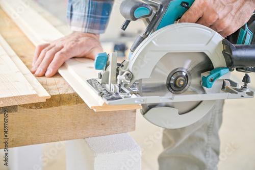 A skilled craftsman operates a circular saw on a wooden plank, showcasing precision and craftsmanship in a well-lit workshop environment, highlighting woodworking techniques