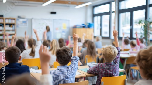 A classroom full of students raising their hands. The teacher is standing in front of the class
