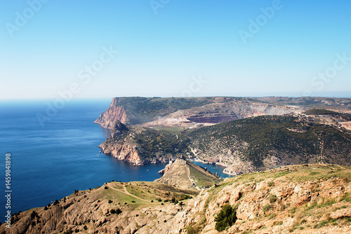 Seascape. View of the coast and the Black Sea in the sunlight. Crimea, Crimean mountains