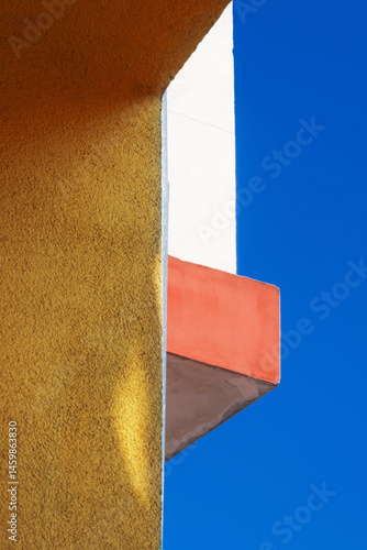 Obraz na płótnie abstract building close up on background blue sky w salonie