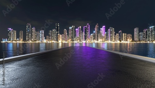 Urban skyline at night, reflecting on water, empty road leading to city