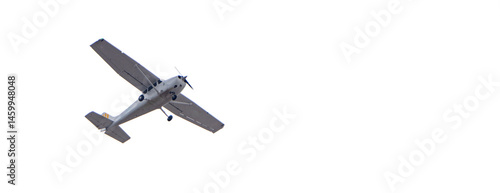 Foto Small propeller private plane in flight